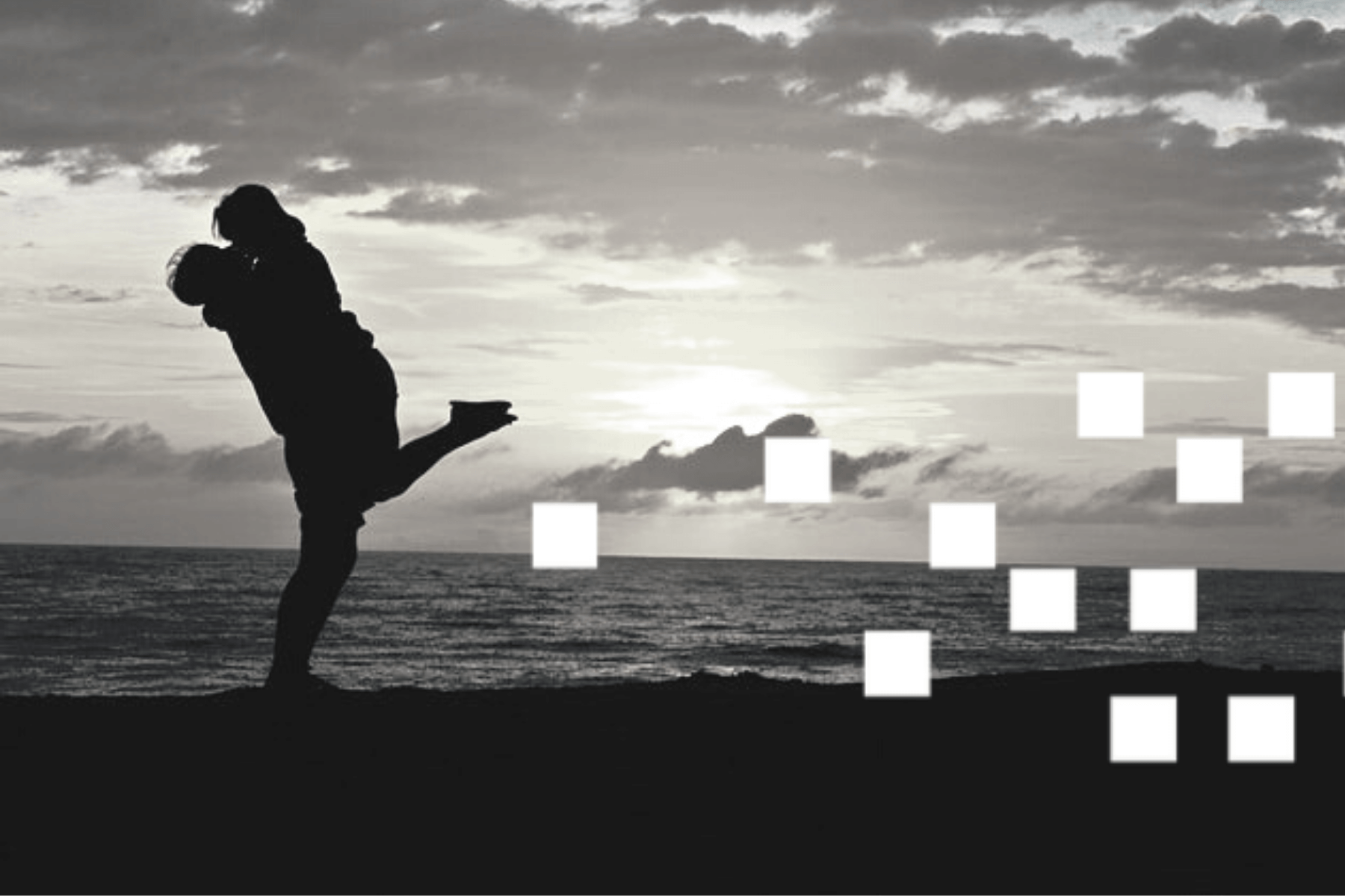 silhouette of couple by the beach