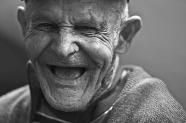 An elderly man full of happiness
